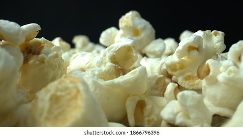 Delicious And Chemical-free Air-popped Popcorn. Stovetop Popcorn On Black Background. High Quality.