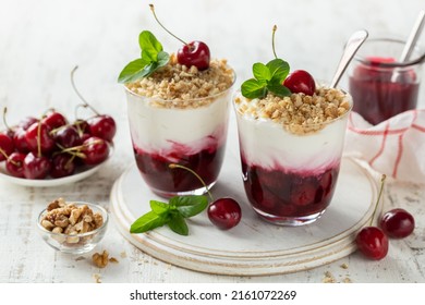 Delicious Cherry Cream Trifle  Dessert In Glass, White Background
