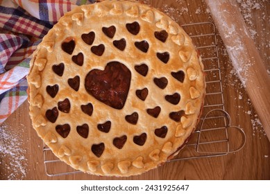 Delicious cherry pie with a cute heart shaped crust - Powered by Shutterstock