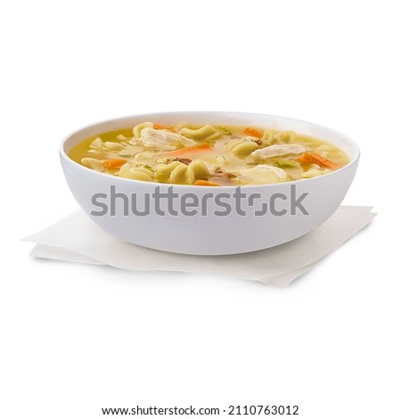 Delicious chicken soup in a bowl, light diet soup side view isolated on white background