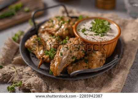 Delicious chicken wings with parmesan mayo and garlic dipping