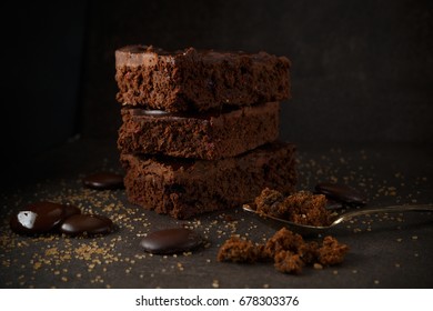 Delicious Chocolate Brownies with Dark Background. Chocolate Cakes with dark background. Low light photography.