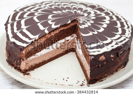 Delicious chocolate cake with chocolate sauce