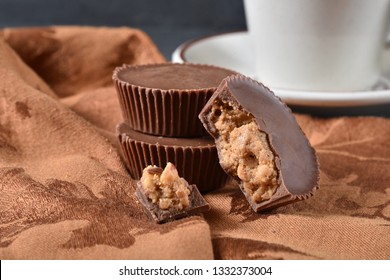 Delicious Chocolate Covered Peanut Butter Cups With A Cup Of Coffee Or Hot Chocolate