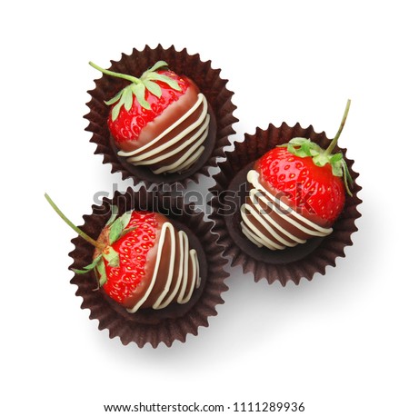 Delicious chocolate covered strawberries on white background, top view