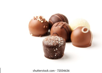 Delicious Chocolate Pralines Isolated On White Background