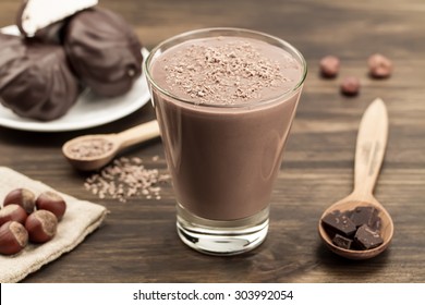delicious chocolate shake with heart on wooden background. Cocktail, smoothies