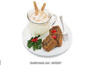 Delicious Christmas Fruitcake Served With A Foamy Mug Of Eggnog.  Isolated On White With Clipping Path.