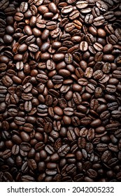 Delicious Coffee Beans background, fresh roasted beans with soft light and texture - Shutterstock ID 2042005232