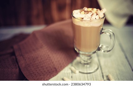 Delicious coffee with marshmallows and milk, shallow depth of field. Cappuccino with nut syrup flavor. An invigorating drink that gives you a positive mood. Warm drinking coffee. - Powered by Shutterstock