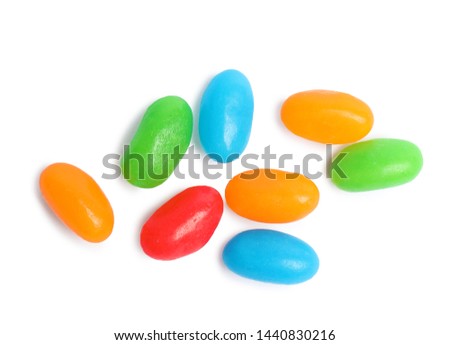 Delicious colorful jelly beans isolated on white, top view