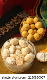 An delicious cookies called 'nastar' or 'pinapple tart' and the white ones called 'putri salju' or 'snow white cookies'. This cookies usually present during Eid in Indonesia.