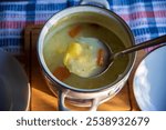 Delicious cream chicken potato soup with vegetables