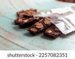 Delicious Crispy Brownies in Clear Zip Bags.
Close-up photo of crispy brownies in clear zip bags, looking delicious and ready to eat. Perfect for food, bakery and dessert themed projects.