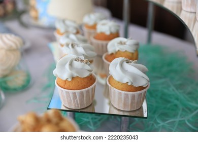 Delicious Cupcakes With Cream On Dessert Stand, Closeup