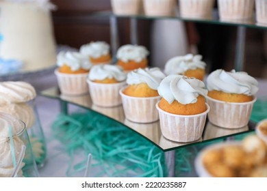 Delicious Cupcakes With Cream On Dessert Stand, Closeup