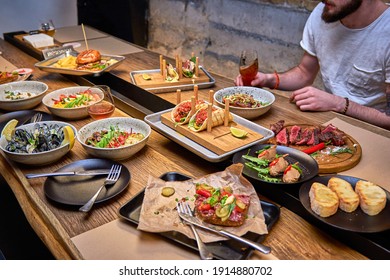 Delicious Dinner In Restaurant On A Wooden Table. Tasty Food With Beer In Cafe Or Pub Menu.