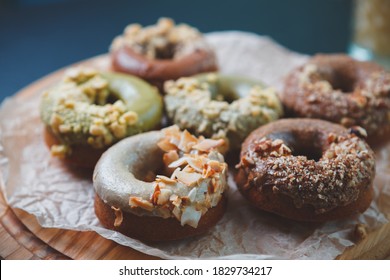 Delicious donuts cooked with natural sweetener.Doughnuts with no sugar prepared for lunch in bakery.Sweet dessert food baked in pastry cafe for breakfast.Enjoy tasty glazed desserts donut with coffee
