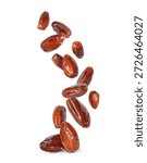 Delicious dried dates are falling down close-up isolated on a white background	