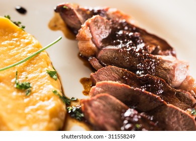 Delicious duck magret with potato parmentier.
