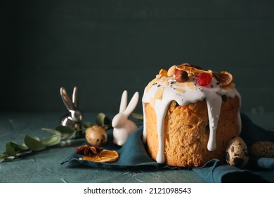 Delicious Easter cake and eggs on table