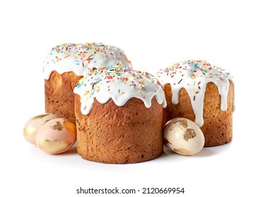 Delicious Easter cakes and eggs on white background