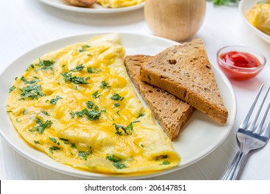 Delicious Egg Omelette With Greens And Cheese