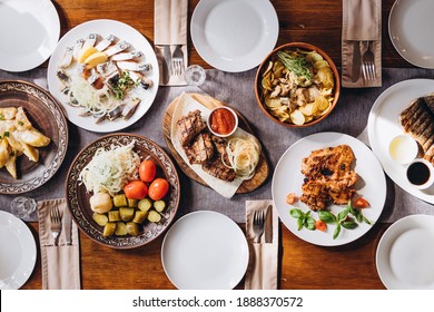 Delicious European And Slavic Cuisine On The Big Table Waiting For Guests. Table With Food, Top View