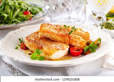 delicious fillets of grilled or oven baked pollock or coalfish served with a fresh salad