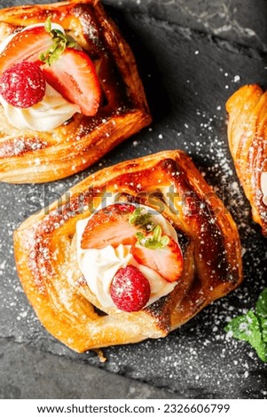 Delicious flaky fresh baked Danish Pastry with Chantilly cream and fresh fruit.