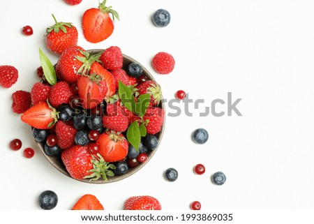 Similar – Image, Stock Photo Bowl of strawberries, blueberries and mint leaves