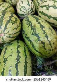 Delicious And Fresh Chinese Watermelon In A Stall For Sale