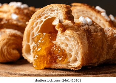 Delicious fresh croissant filled with apricot jam, european dessert  - Powered by Shutterstock