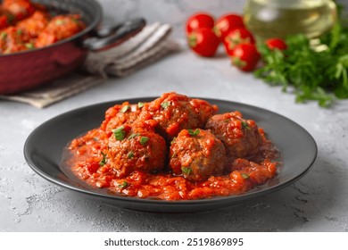 Delicious fresh meatballs in tomato sauce with salt, spices and herbs  - Powered by Shutterstock