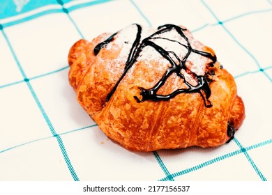 Delicious Fresh Pastry Croisant With Chocolate And Powdered Suga