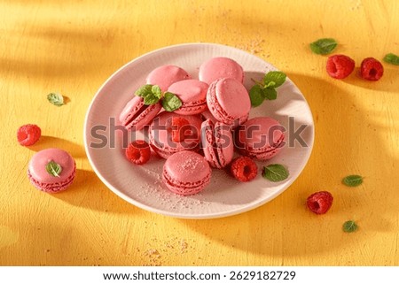 Delicious and fresh raspberry macarons made of juicy fruit. Red macarons made of fruits.