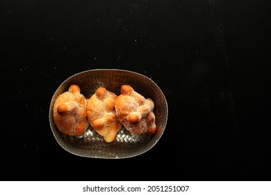 Delicious, Fresh, Sugary And Freshly Made Mexican Dead Bread That Is Made For The Day Of The Faithful Dead And All Saints That Is Celebrated In November In Mexico In A Handmade Woven Basket
