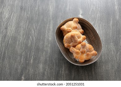 Delicious, Fresh, Sugary And Freshly Made Mexican Dead Bread That Is Made For The Day Of The Faithful Dead And All Saints That Is Celebrated In November In Mexico In A Handmade Woven Basket
