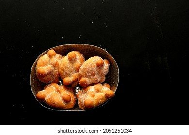 Delicious, Fresh, Sugary And Freshly Made Mexican Dead Bread That Is Made For The Day Of The Faithful Dead And All Saints That Is Celebrated In November In Mexico In A Handmade Woven Basket
