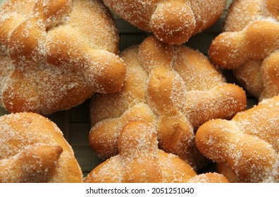 Delicious, Fresh, Sugary And Freshly Made Mexican Dead Bread That Is Made For The Day Of The Faithful Dead And All Saints That Is Celebrated In November In Mexico In A Handmade Woven Basket
