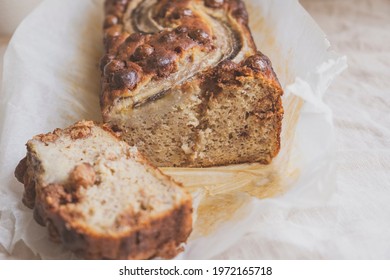 Delicious Freshly Baked Banana Bread With Chocolate Chips On White Tablecloth Background. Sweet Vegan Gluten Free Food, From Above. Homemade Baked Goods.