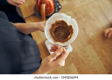 Delicious, Freshly Ground Morning Coffee Powder In The Coffee Filter. View From Above