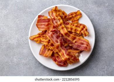 Delicious Fried Bacon Served On Plate.