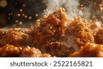 Delicious fried chicken glistens with crispy coating, surrounded by flavorful sauce. steam rises, enhancing mouthwatering appeal of this high end food dish.