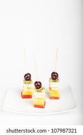 Delicious Fruit Kabobs Isolated Over White Background