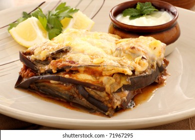 Delicious Greek Moussaka With Aubergine And A Side Garden Salad.