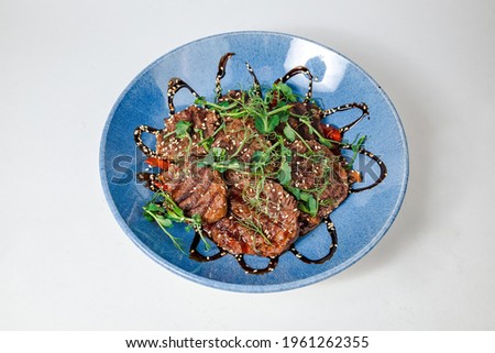 Delicious grilled beef with sesame seeds