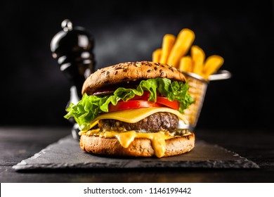 Delicious grilled burgers - Shutterstock ID 1146199442
