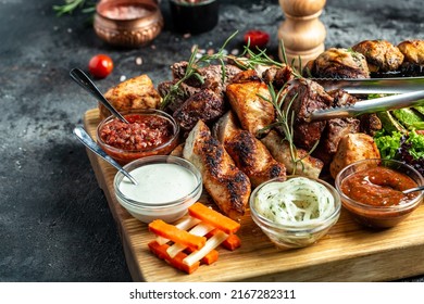 Delicious Grilled Meat With Vegetable. Mixed Grilled Bbq Meat With Vegetables On Wooden Platter. Restaurant Menu, Dieting, Cookbook Recipe Top View,