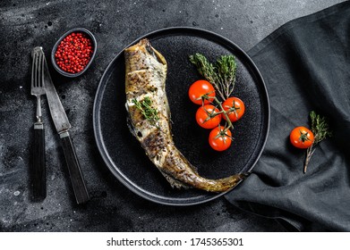 Delicious Grilled Pollock With Fresh Thyme And Tomatoes. Black Background. Top View